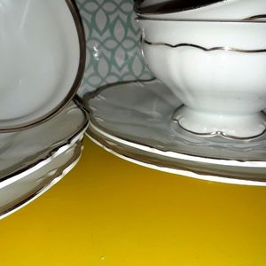 4 teacups and saucers. Saladmaster Bavarian wedding band design